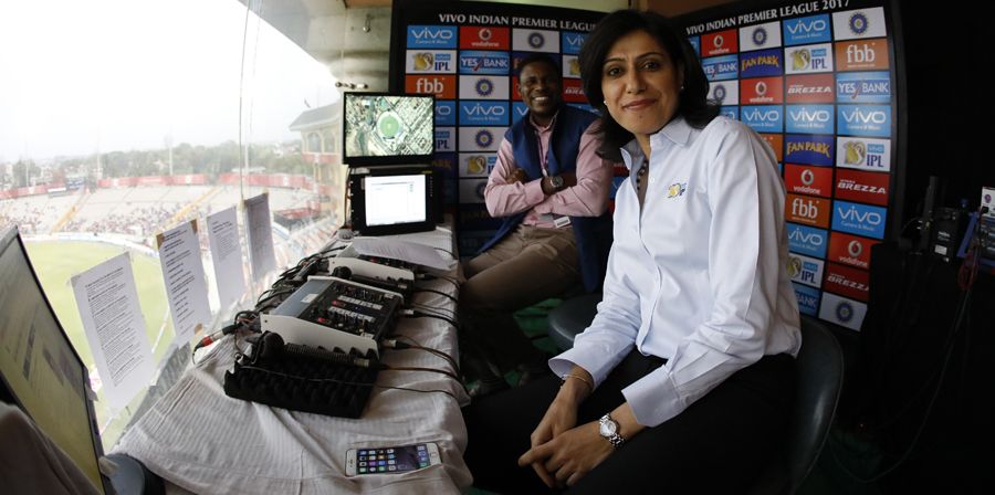Anjum Chopra and Pommie Mbangwa share a moment in the commentary box