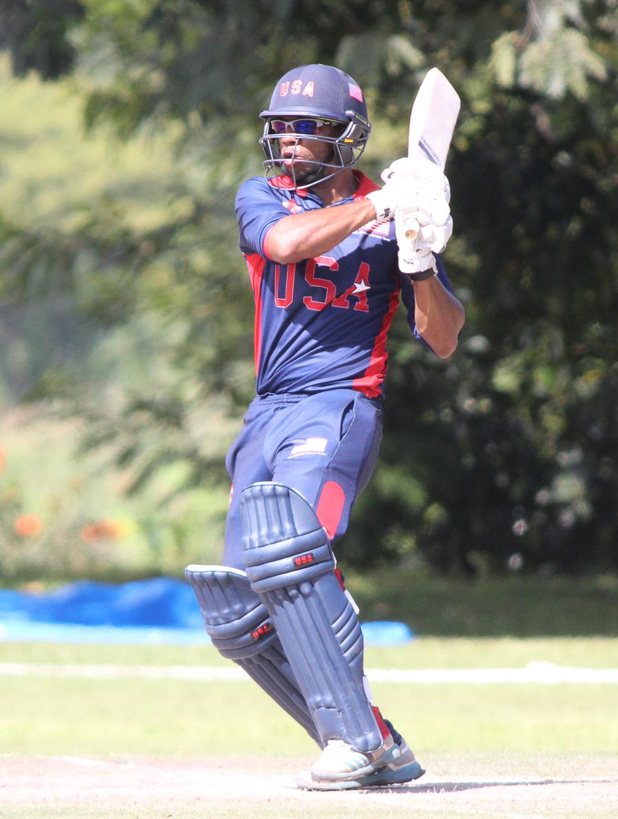 Camilus Alexander pulls over mid-on for a boundary in his unbeaten 30