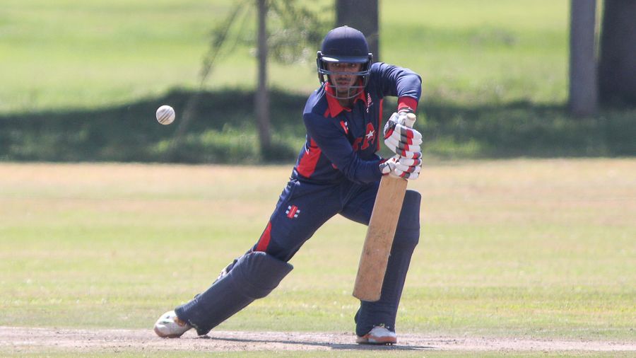 Sagar Patel looks for a single in the off side during his 33