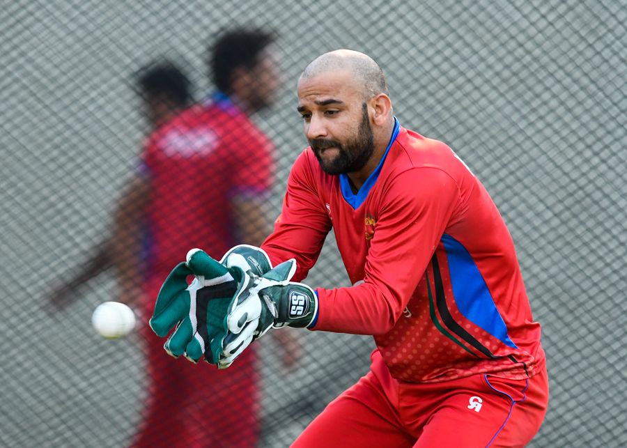 Shafiqullah hones his glovework during a training session