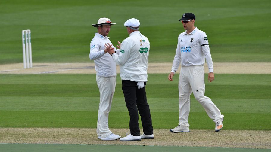 Sussex captain Chris Nash debates a decision with umpire Neil Mallender.