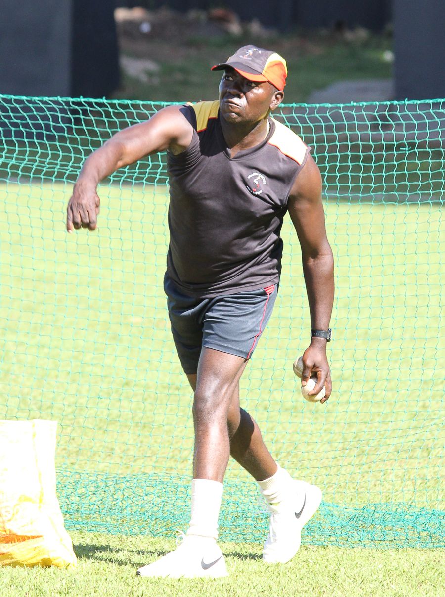 Uganda coach Steve Tikolo gives throwdowns during a training session