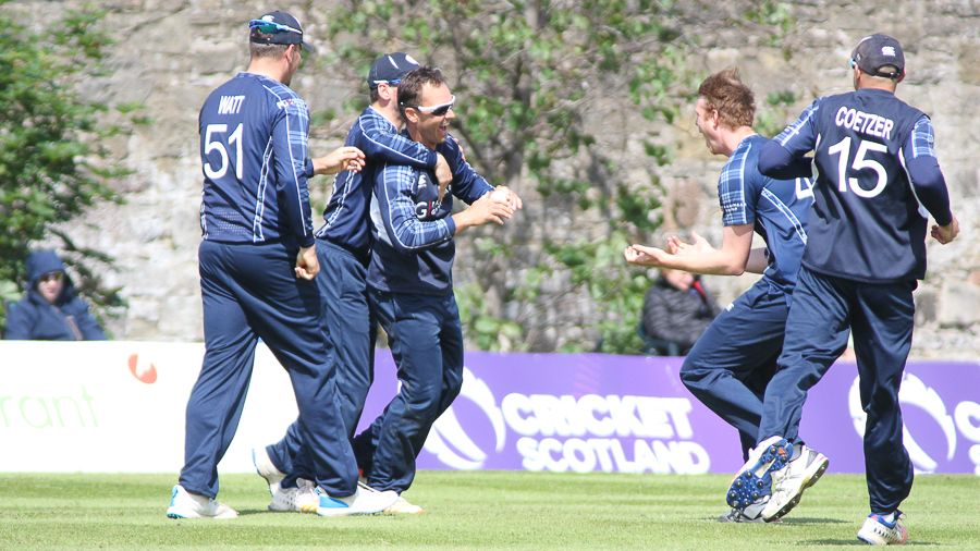 Con de Lange gets mobbed after a stunning catch to remove Craig Williams,