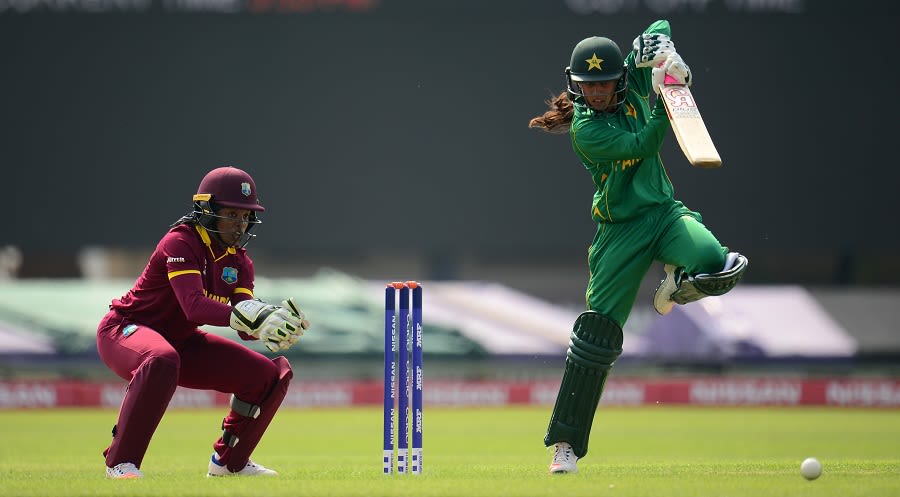 Nain Abidi punches the ball down the ground
