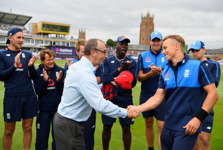 Tom Curran receives his T20 cap from David Lloyd