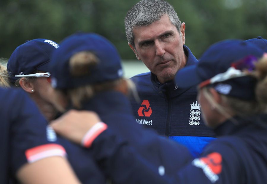 Mark Robinson, coach of England women, addresses the huddle
