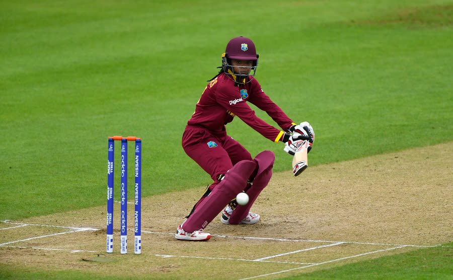 Felecia Walters guides one to third man