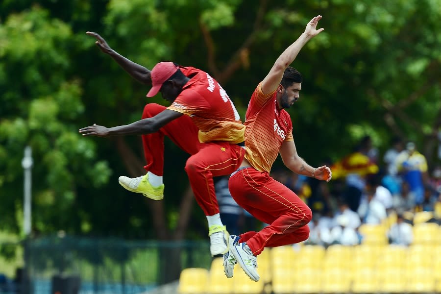 Graeme Cremer and Chris Mpofu take flight to celebrate a wicket