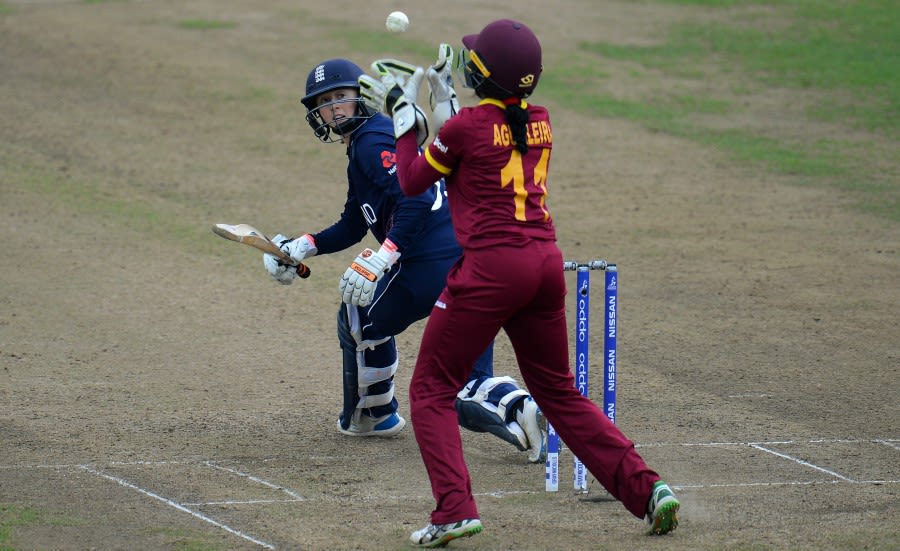 Merissa Aguilleira completes the catch of Fran Wilson