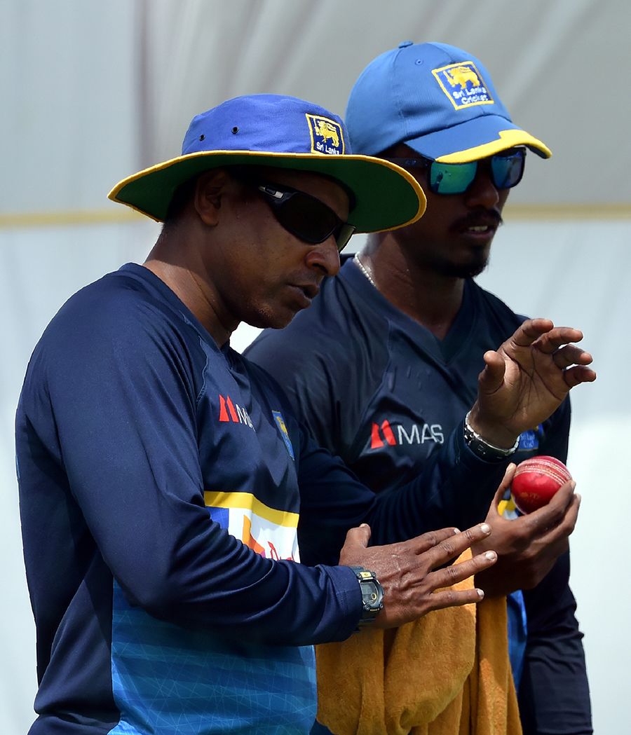 Chaminda Vaas shares a few tips with fast bowler Vishwa Fernando