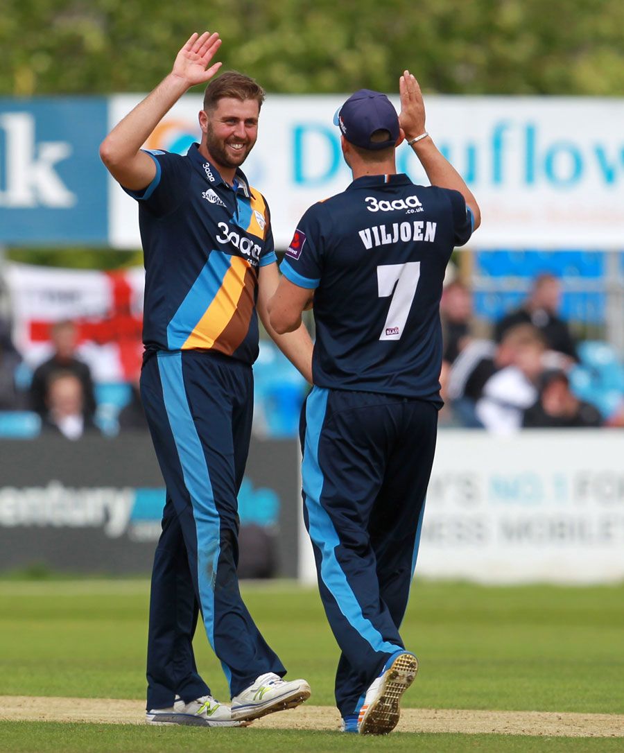 Ben Cotton celebrates a wicket
