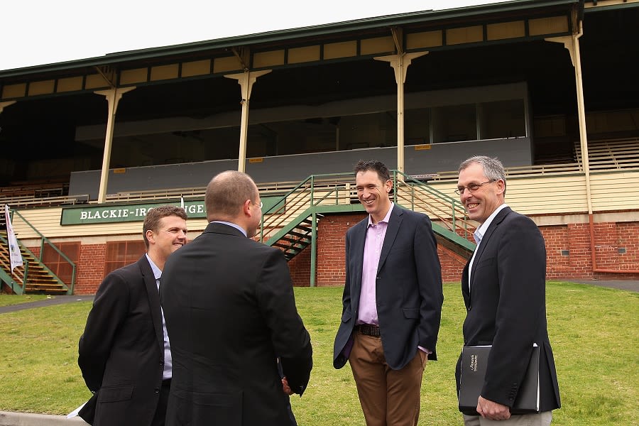 Tony Dodemaide (far right) with James Sutherland at the Junction Oval redevelopment announcement