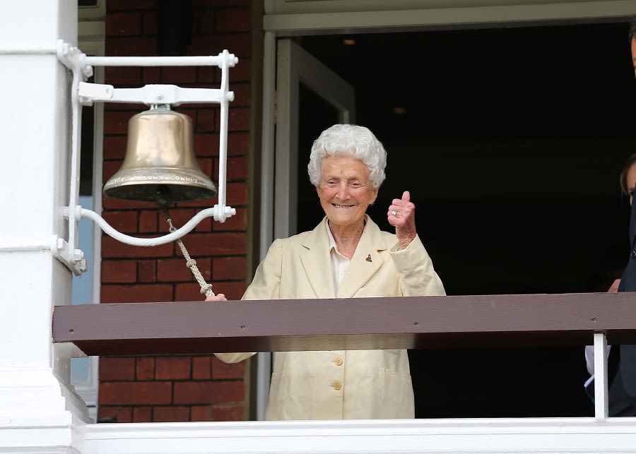 Eileen Ash, the oldest living Test cricketer, rings the bell before the match