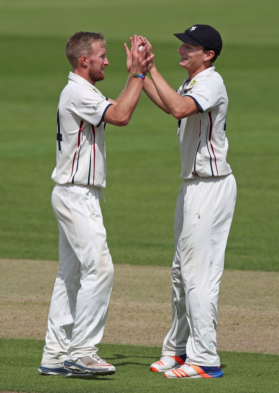 Adam Ball high fives Will Gidman