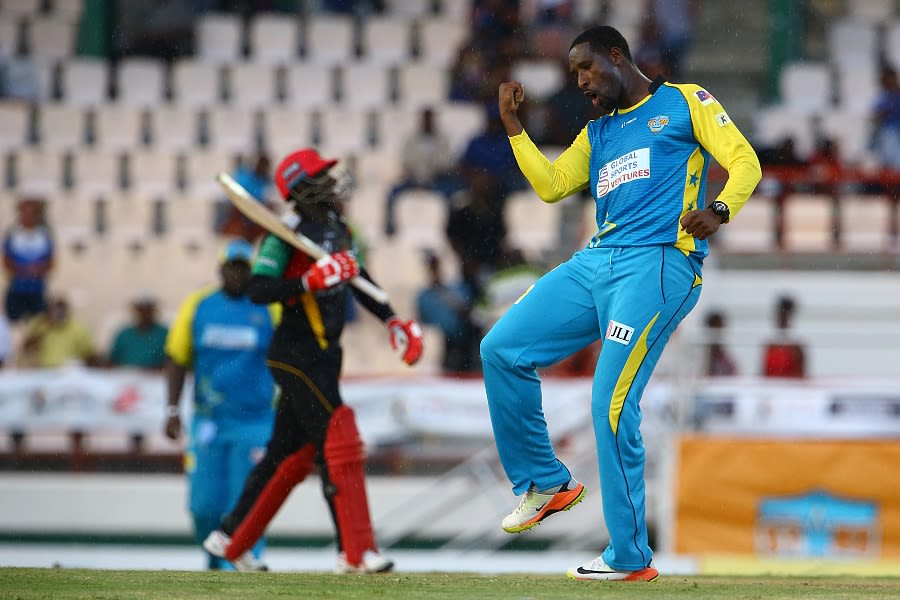 Shane Shillingford enjoys Devon Smith's dismissal