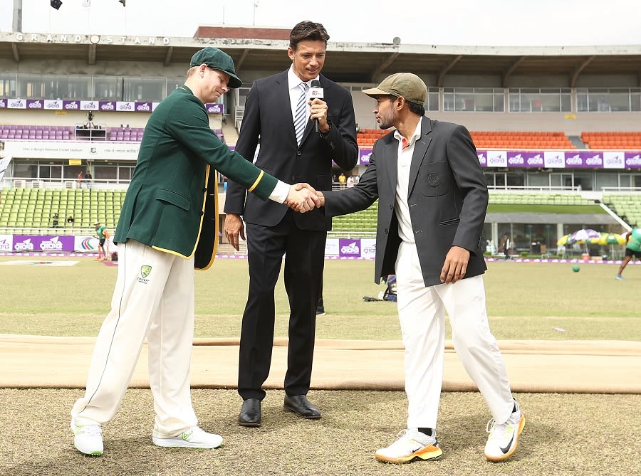 Steven Smith and Mushfiqur Rahim shake hands at the toss as Brendon Julian watches on