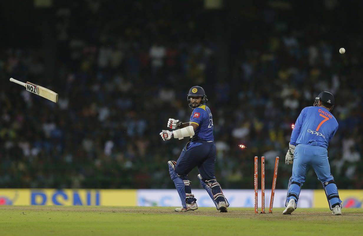 Dilshan Munaweera loses his bat, and his off stump