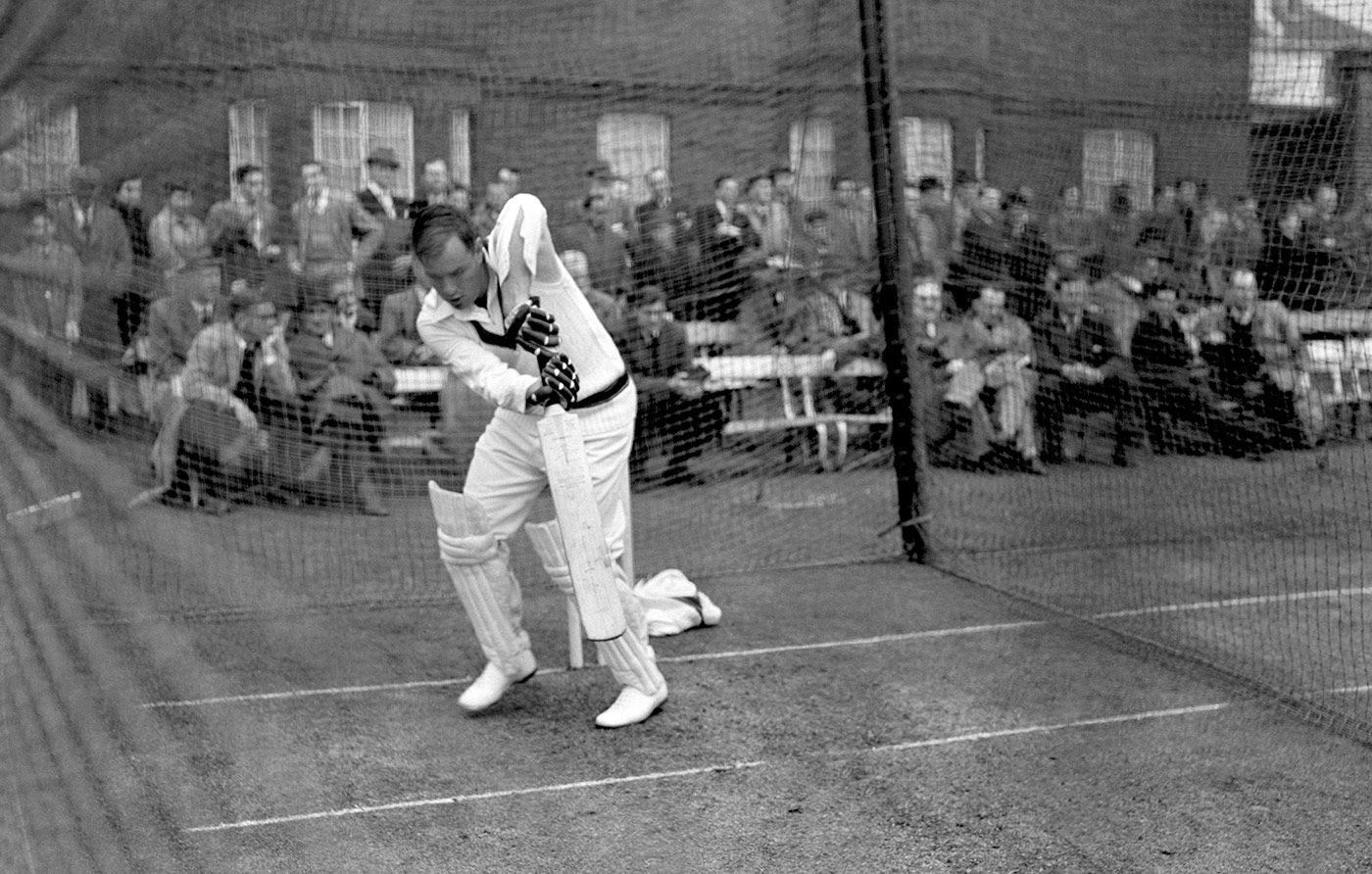 Ron Archer plays a defensive shot in the nets