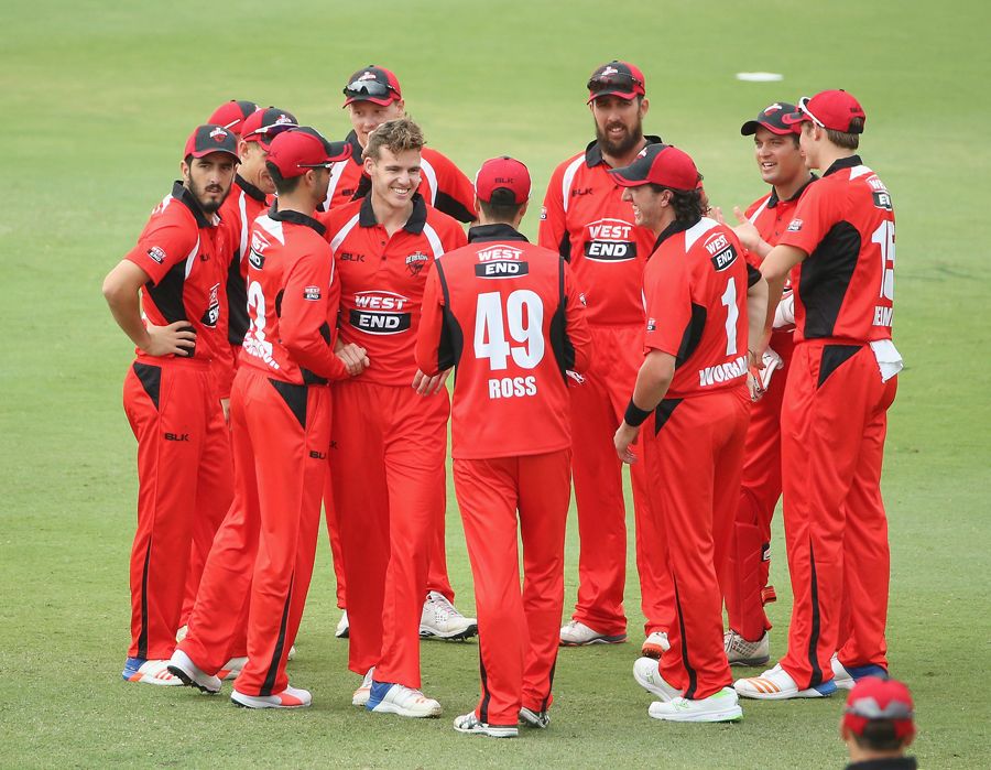 Nick Winter celebrates the wicket of Max Bryant with his team-mates