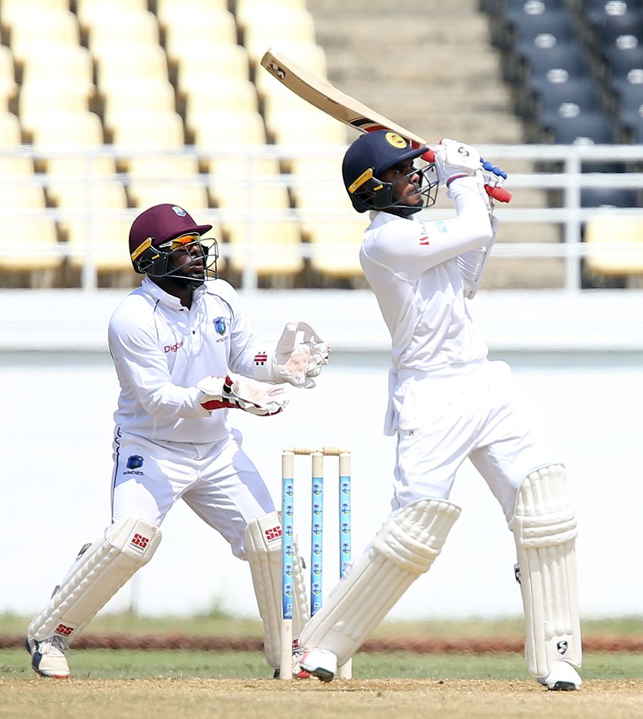 West Indies A keeper Jahmar Hamilton watches Sri Lanka A captain Dhananjaya de Silva hit a six