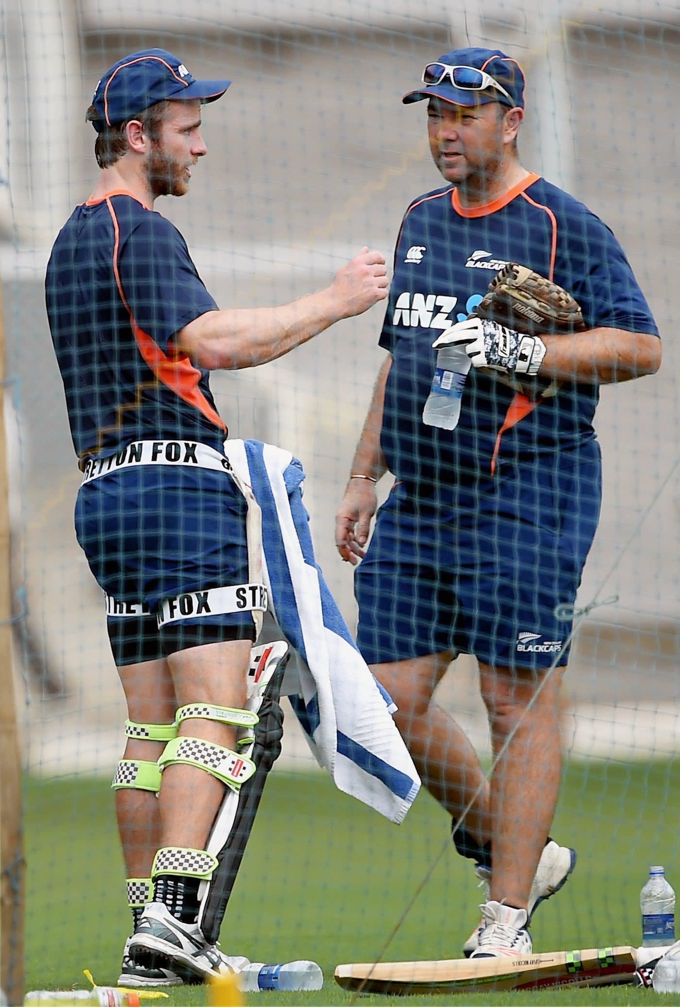 Kane Williamson and Craig McMillan have a chat in the nets