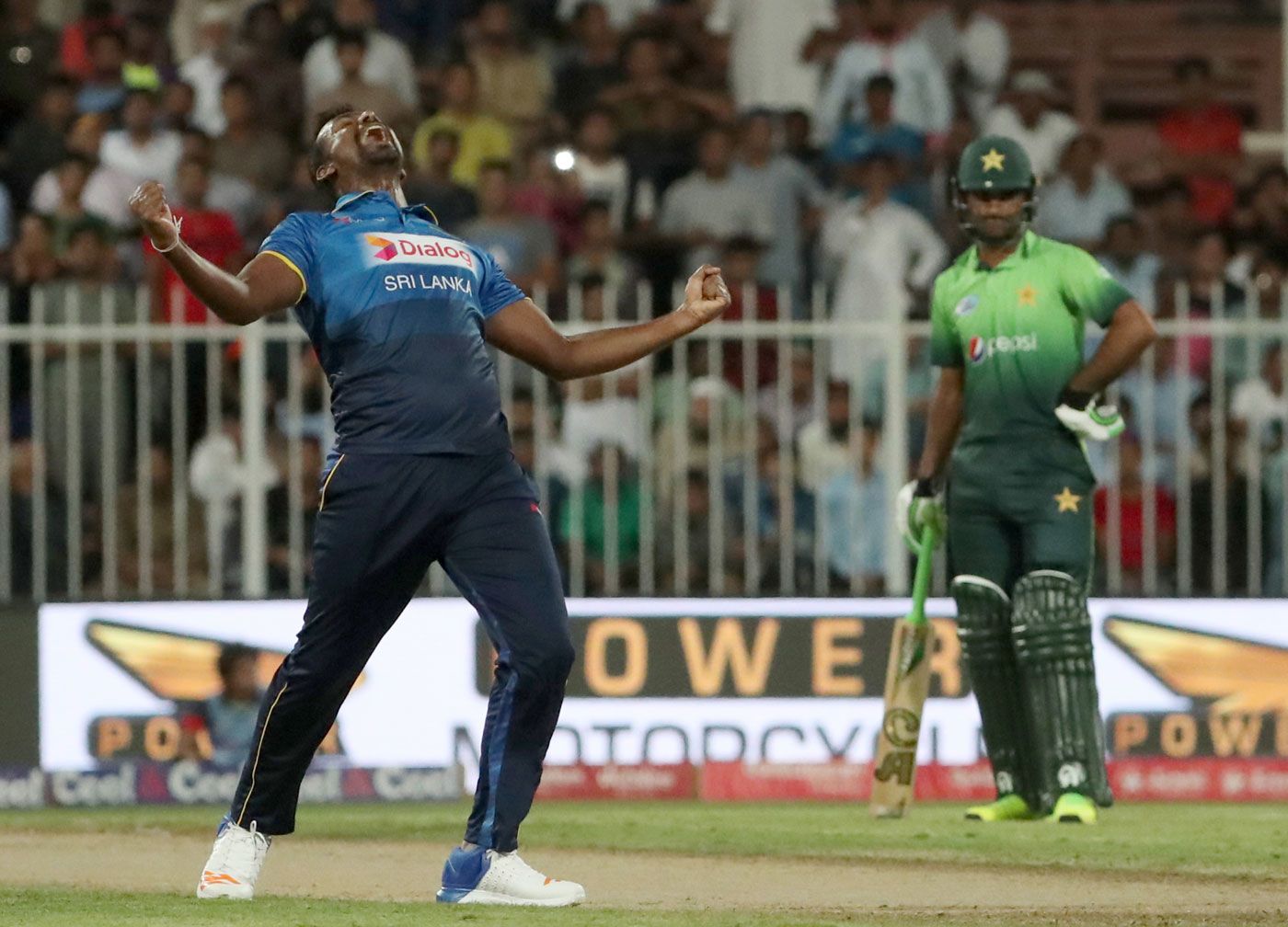 Lahiru Gamage wails after taking a wicket