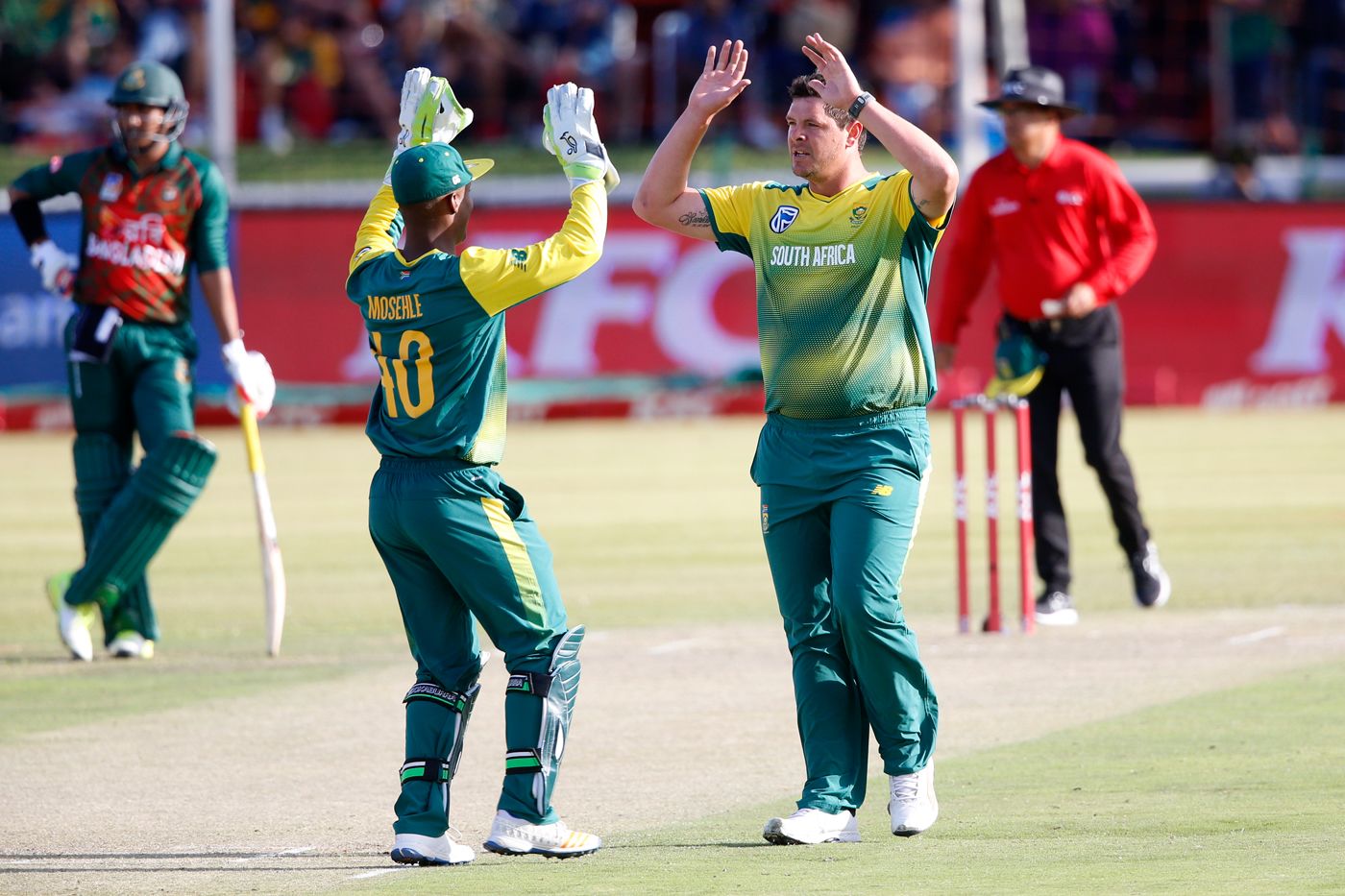 Robbie Frylinck celebrates the wicket of Mushfiqur Rahim