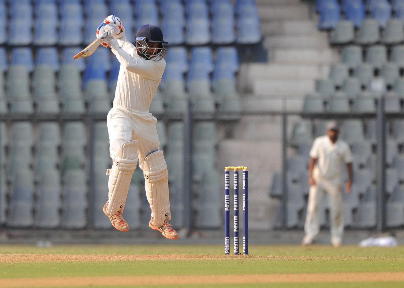 Aditya Waghmode punches through the off side