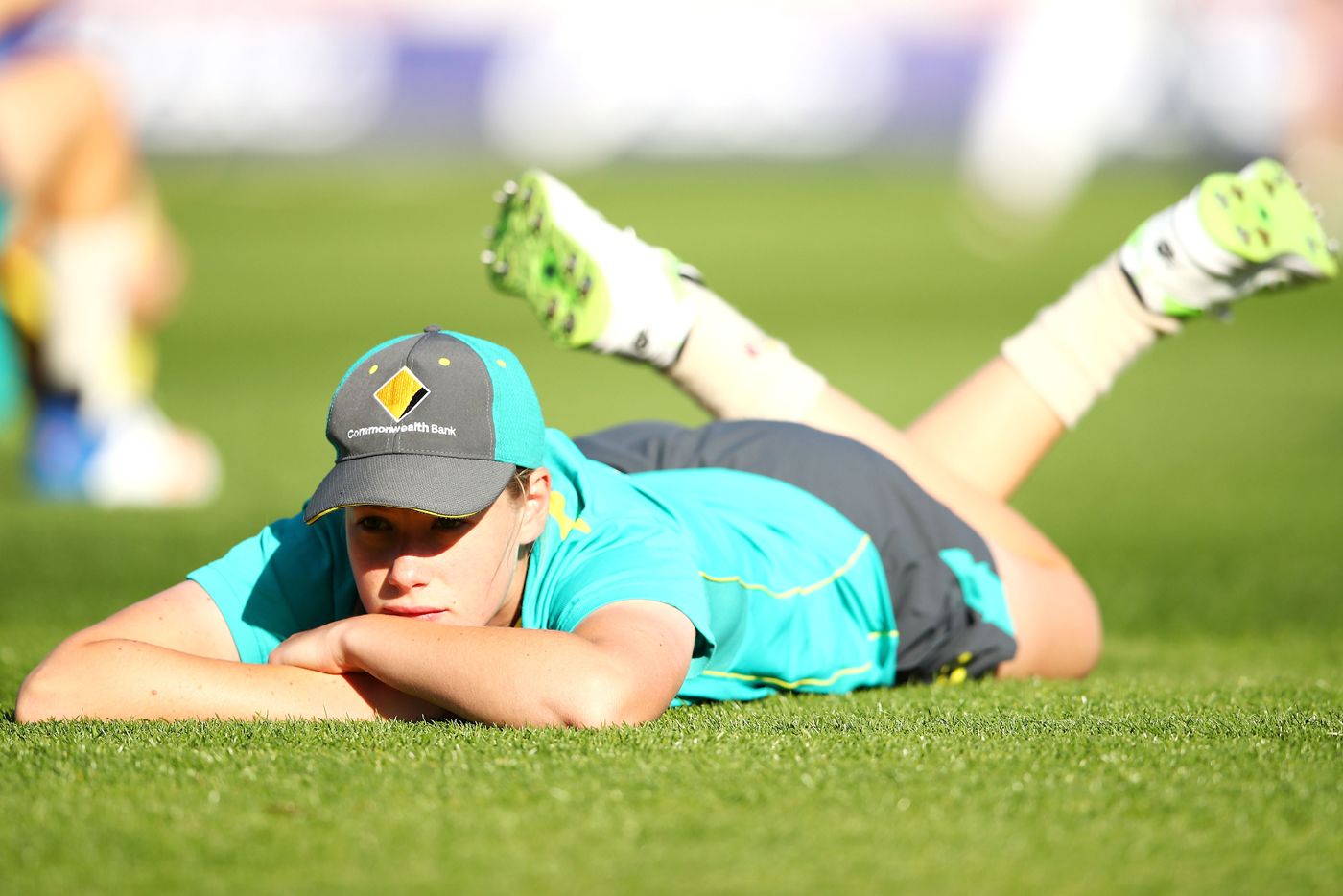 Lauren Cheatle stretches during a training session