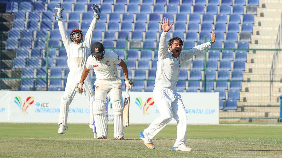 Rashid Khan wins an lbw appeal for the wicket of Rameez Shahzad