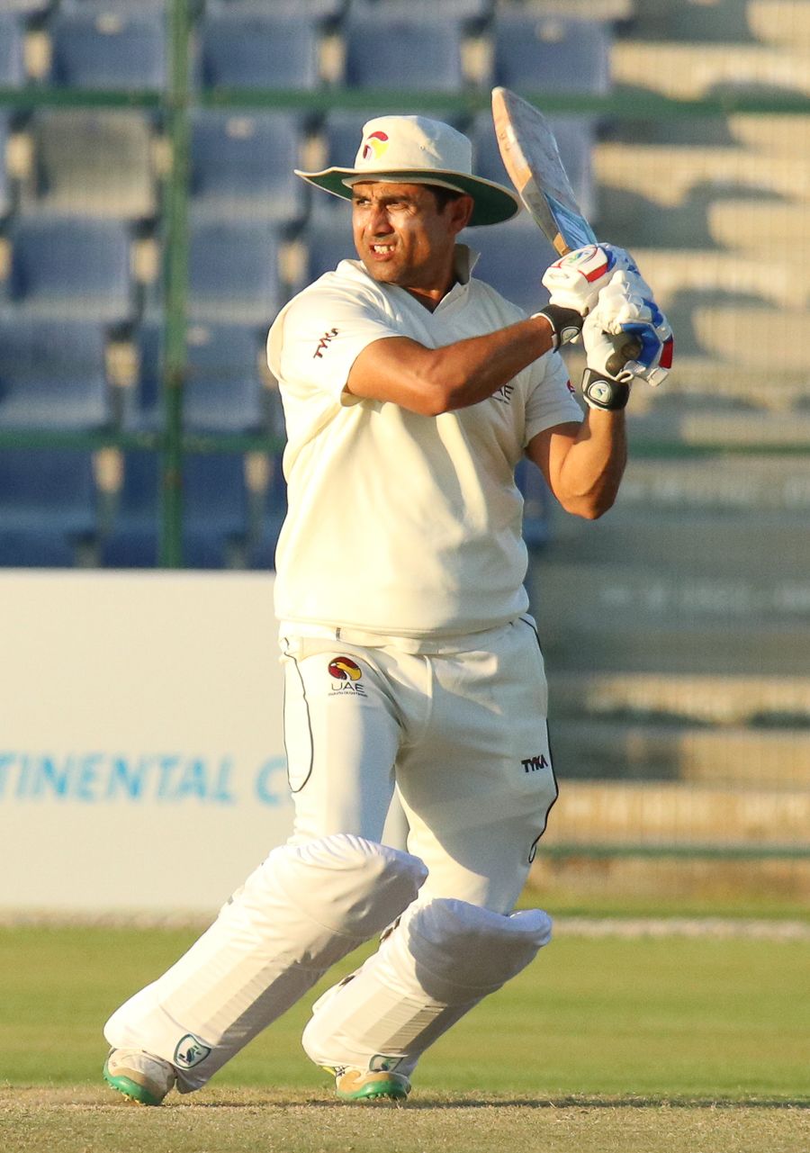 Shaiman Anwar completes a back foot drive through the off side