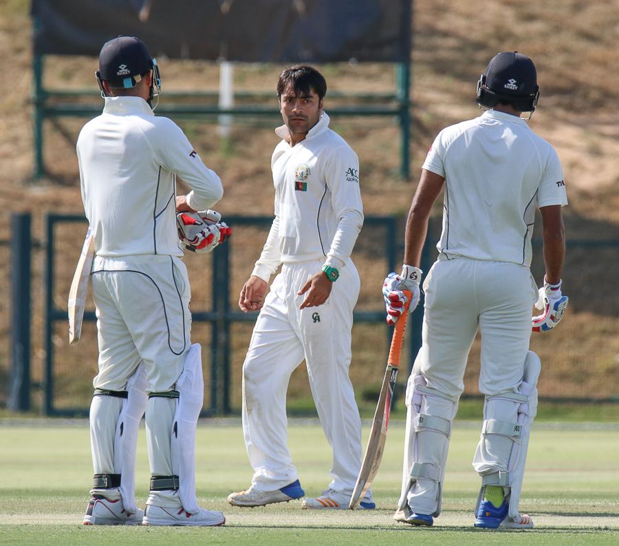 Rashid Khan has a stare down with Rohan Mustafa and Chirag Suri