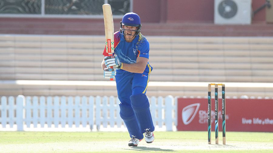 Louis van der Westhuizen drives down the ground for a boundary
