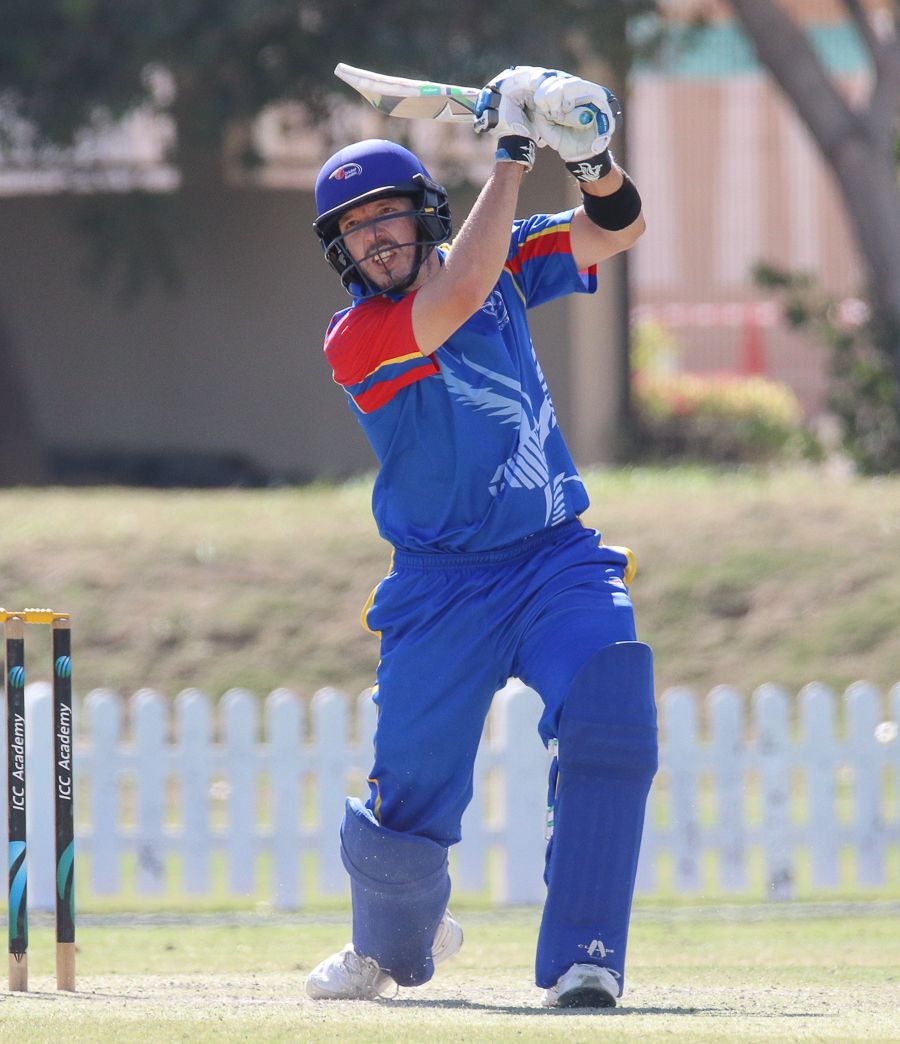 Sarel Burger drives over cover for a boundary