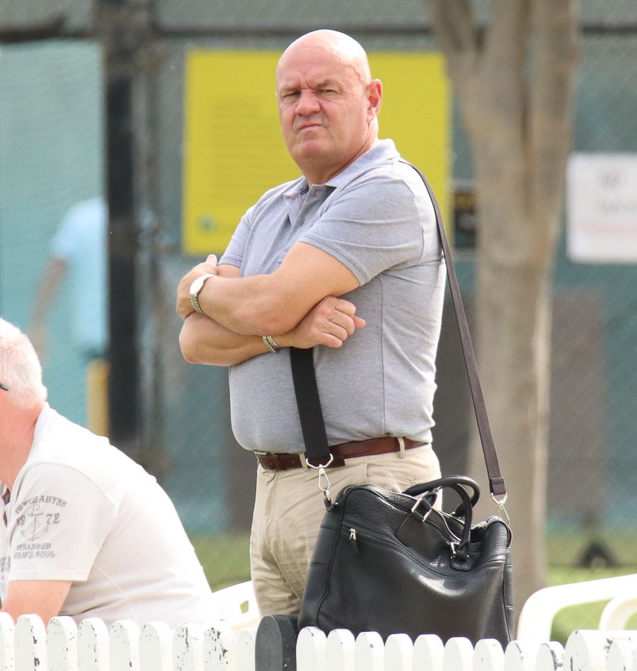 Cricket PNG chief executive Greg Campbell looks on anxiously as his team concedes a big total