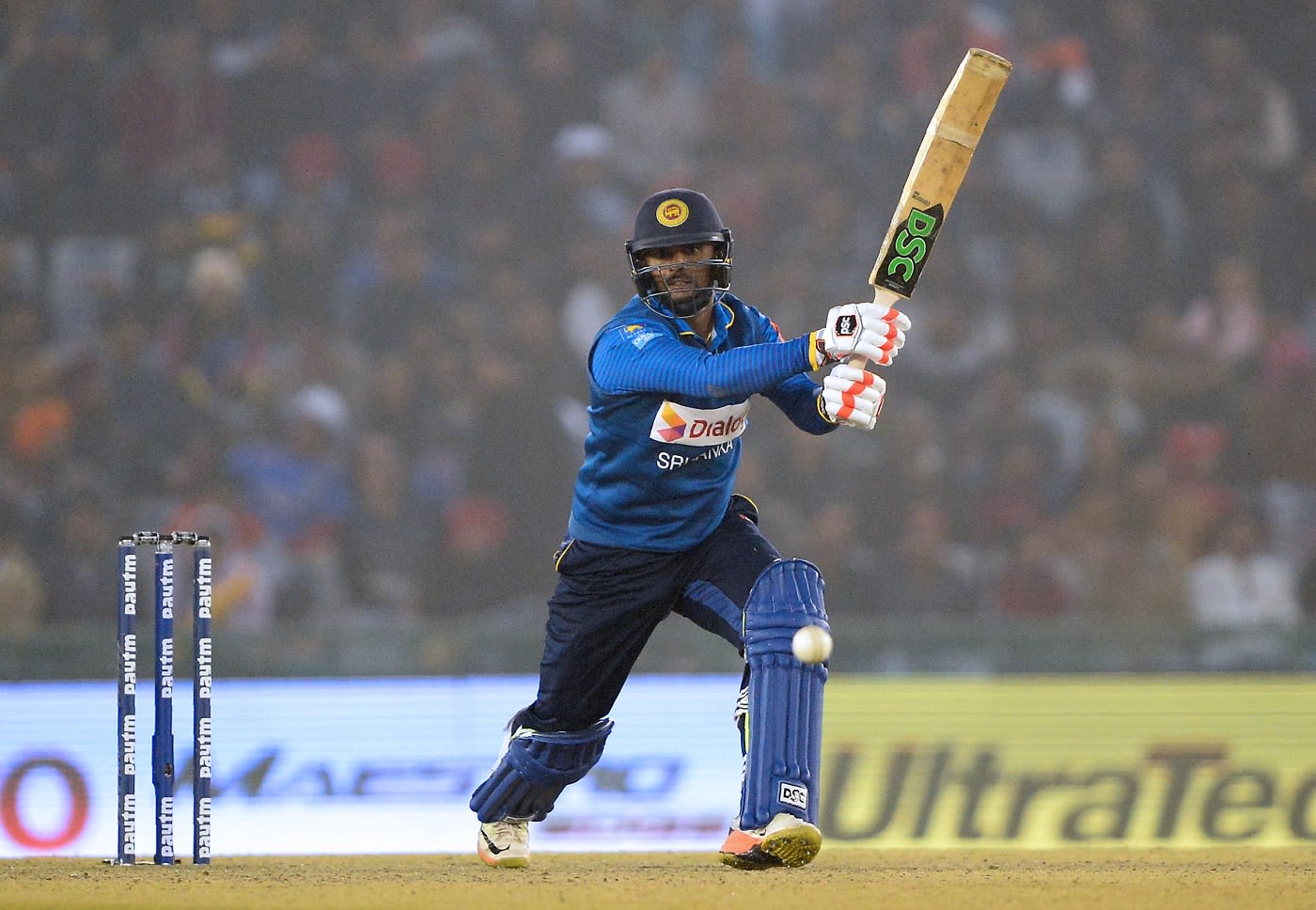 Asela Gunaratne hits down the ground