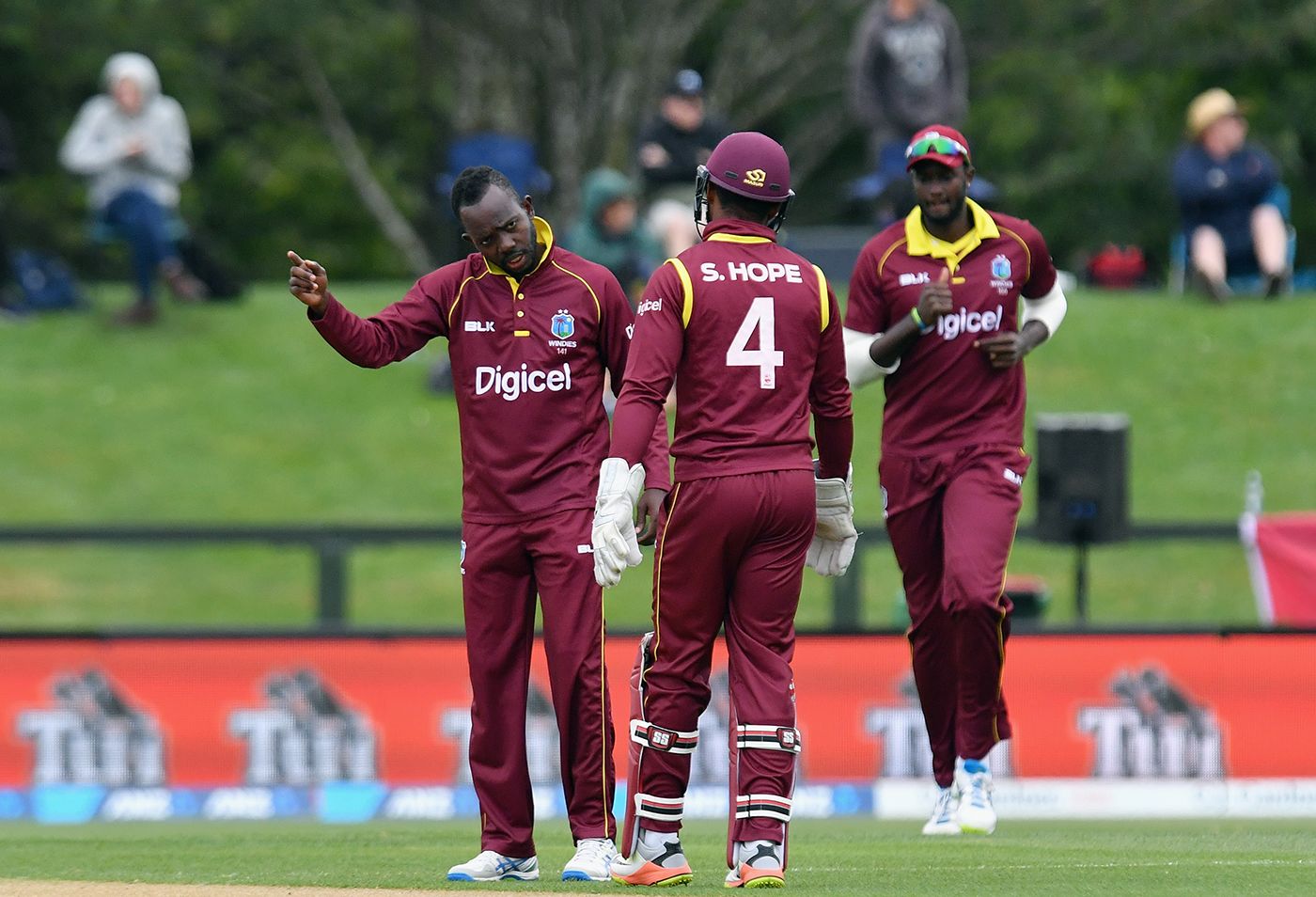 Nikita Miller celebrates the wicket of Tom Latham