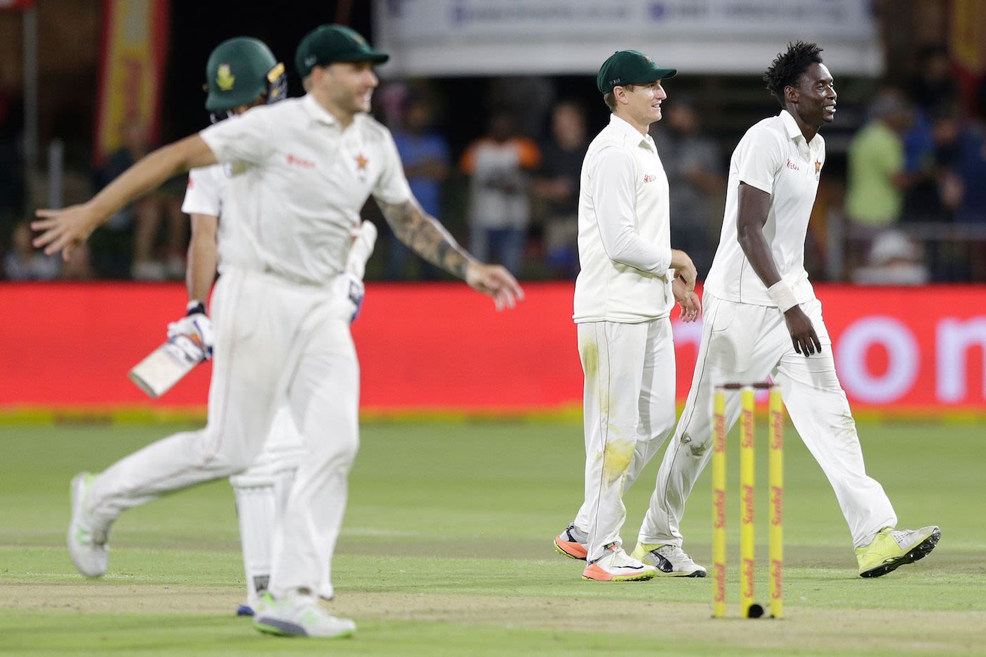 Chris Mpofu heads towards the fielder after taking a wicket