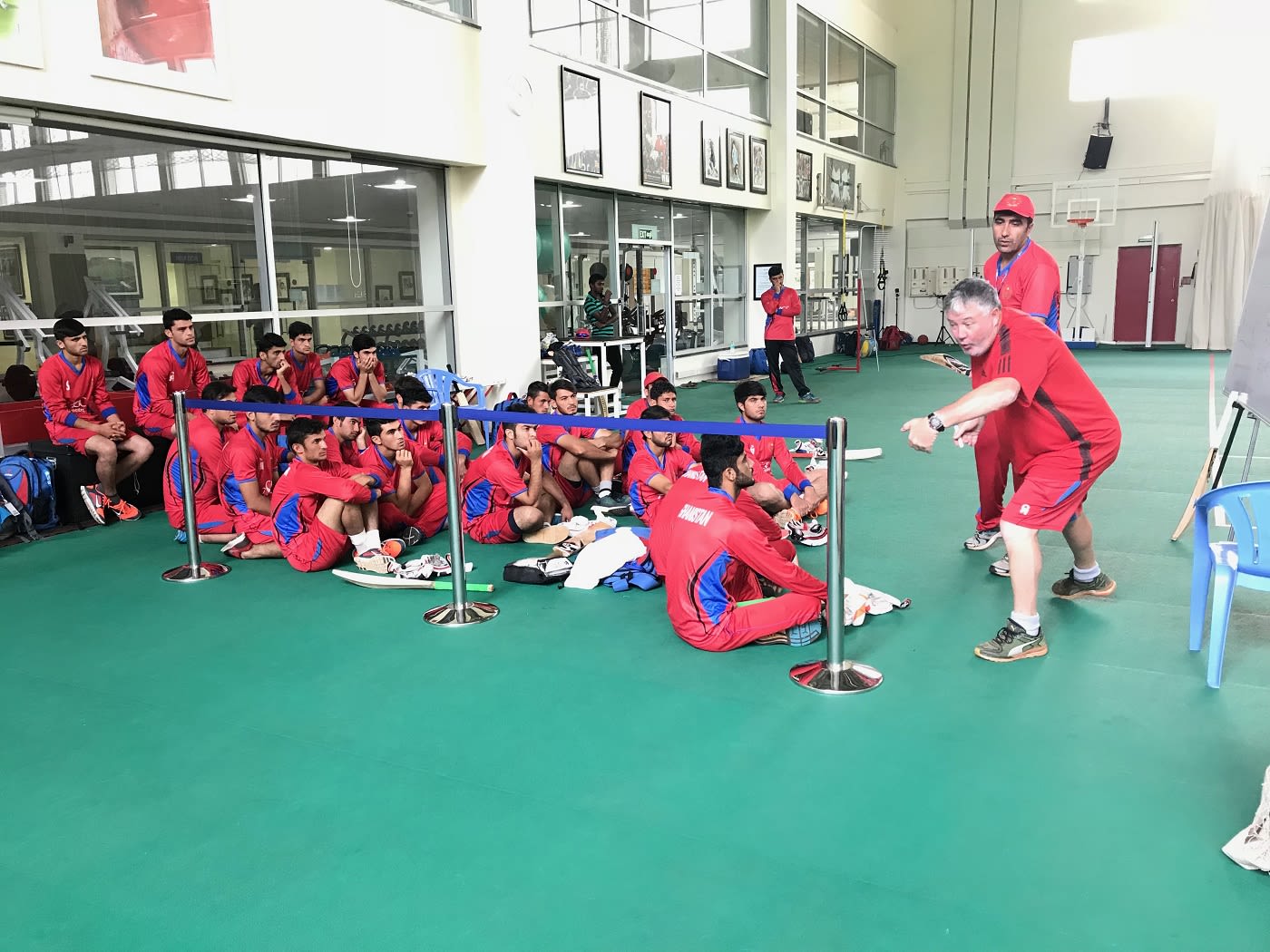 Afghanistan Under-19 coach Andy Moles addresses his team