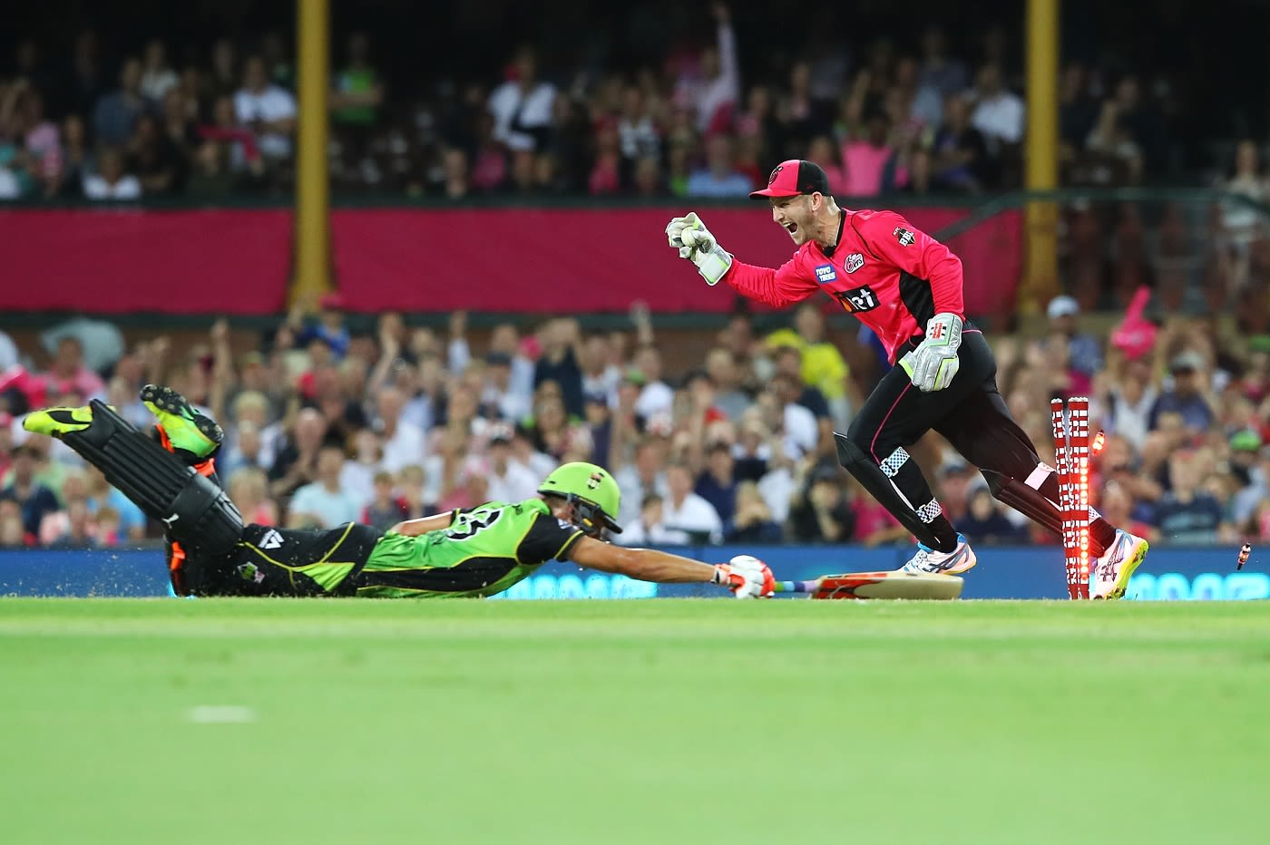 Peter Nevill runs Chris Green out for 49