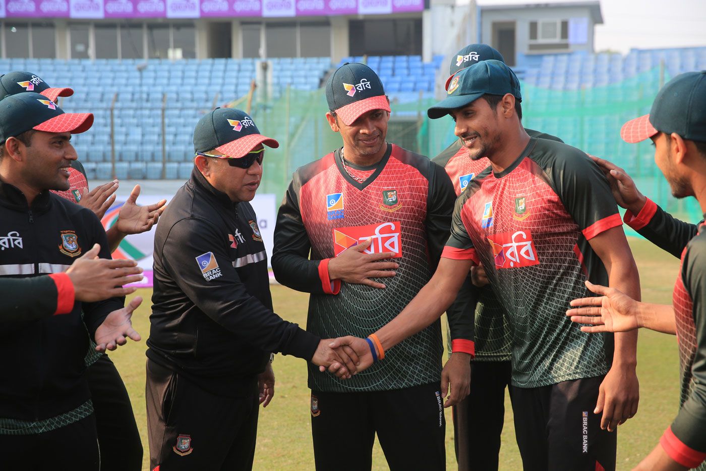 Sunzamul Islam gets a message from Khaled Mahmud after receiving his Test cap