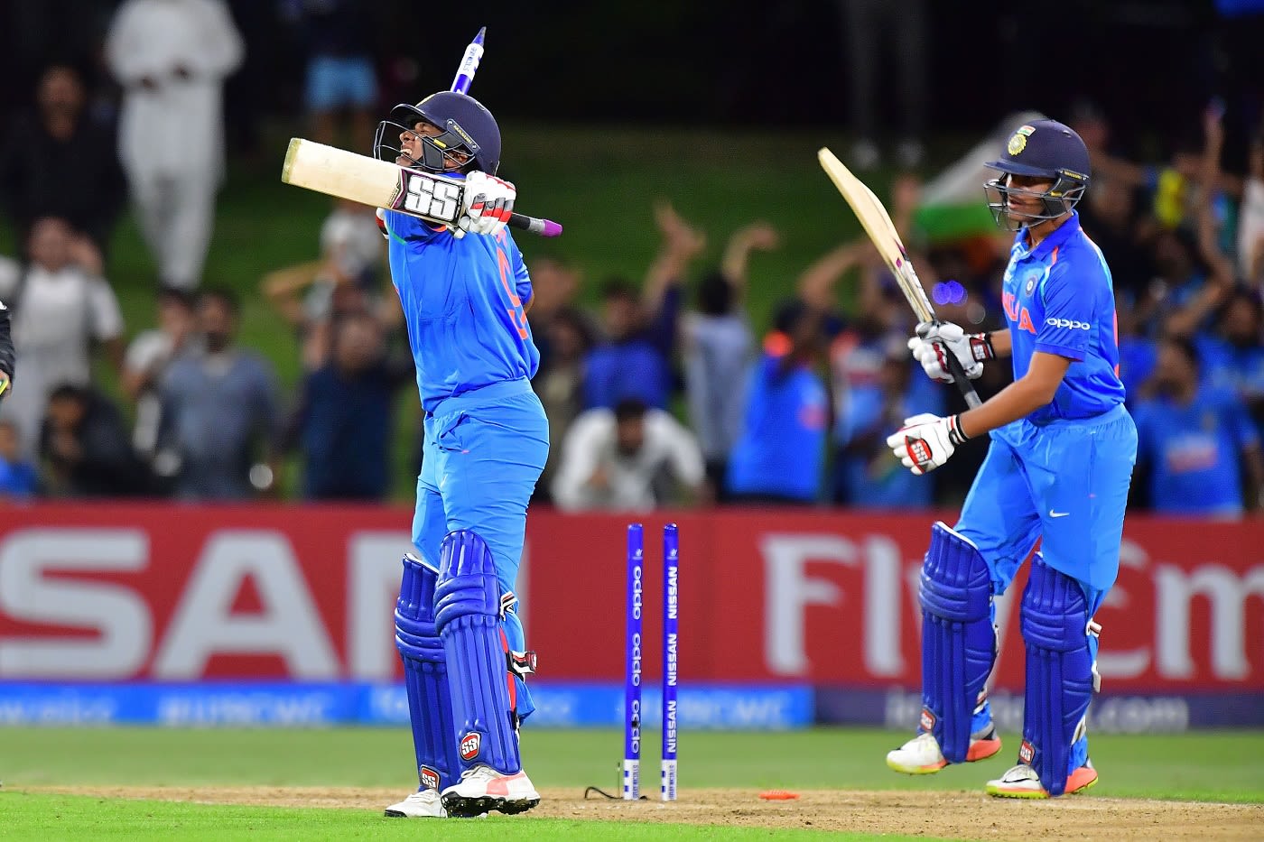 Manjot Kalra and Harvik Desai celebrate India's win