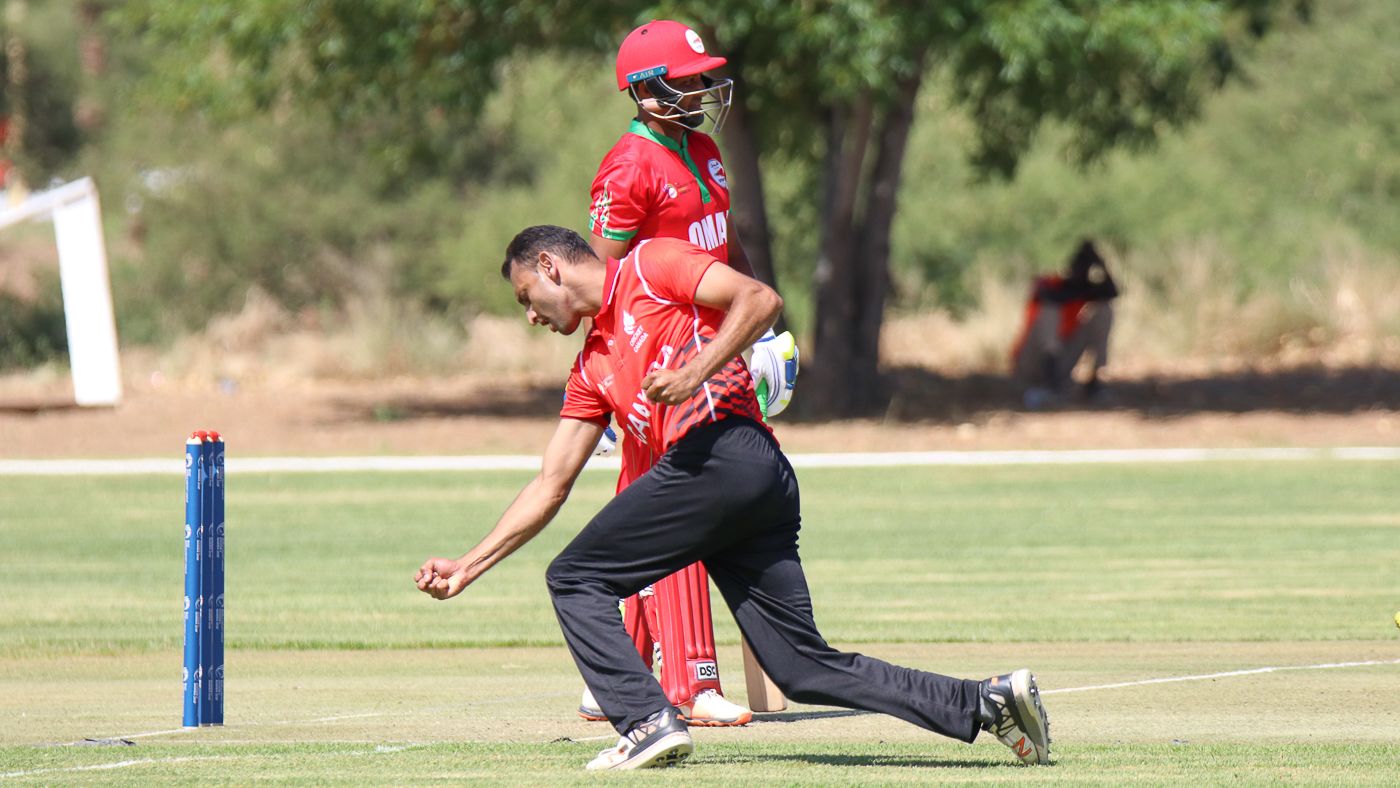 Cecil Pervez goes into fist pump mode after claiming Sultan Ahmed with an lbw appeal