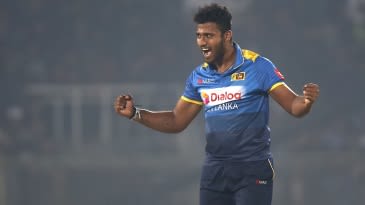 How many bowlers have taken their first three international wickets in a hat-trick?