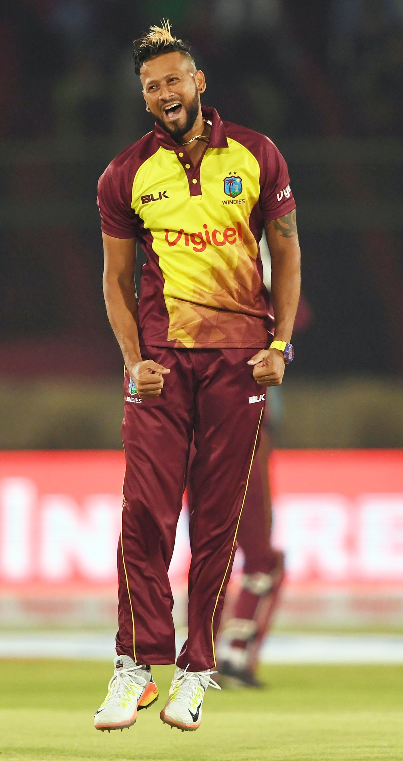 Rayad Emrit celebrates a wicket with a leap