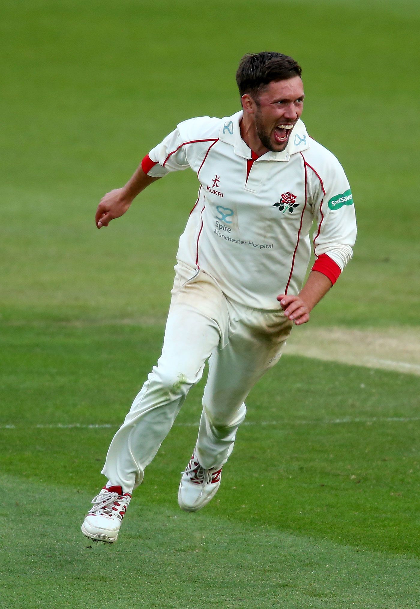 Simon Kerrigan celebrates a wicket