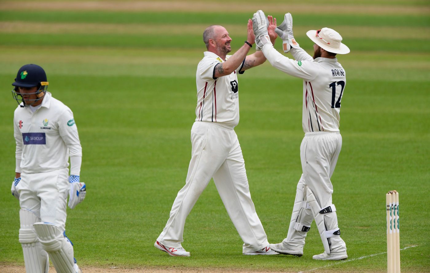 Darren Stevens celebrates with Adam Rouse