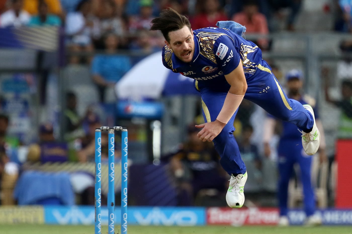 Mitchell McClenaghan bends his back