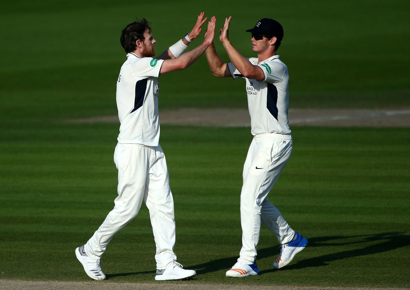 James Harris gets a high five from Hilton Cartwright