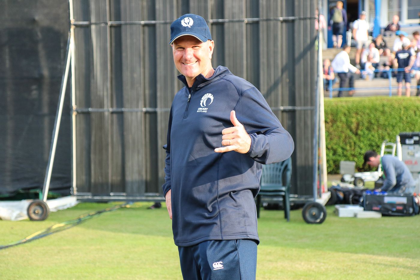 Scotland coach and big wave surfer Grant Bradburn throws up the 'shaka' after the win